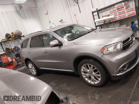 2016 Dodge Durango Limited with VIN 1C4RDJDG0GC474211, listed as a IAAI auction lot 42235569 with 105,320 mi miles and . Bid and sale history available at DreamBid. Image 14.