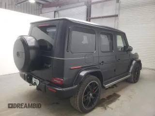 2022 Mercedes-Benz G 63 AMG with VIN W1NYC7HJ2NX444083, listed as a Copart auction lot 64764324 with 7,909 mi miles and Salvage title. Bid and sale history available at DreamBid. Image 3.