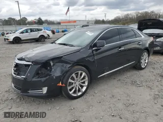 2016 Cadillac XTS Luxury Collection with VIN 2G61M5S35G9210819, listed as a Copart auction lot 43976065 with 163,148 mi miles and Salvage Title. Bid and sale history available at carsss.com. Image 1.