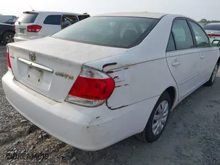 2005 Toyota Camry STD with VIN 4T1BE32K85U401432, listed as a IAAI auction lot 42093301 with 228,557 mi miles. Bid and sale history available at carsss.com. Image 6.