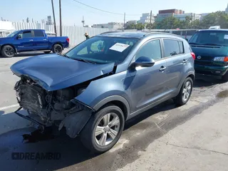 2011 Kia Sportage LX with VIN KNDPB3A23B7137650, listed as a IAAI auction lot 41979477 with 243,186 mi miles and . Bid and sale history available at carsss.com. Image 2.