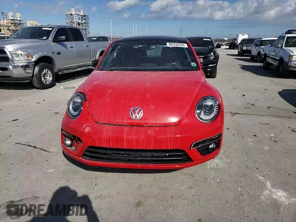 2014 Volkswagen Beetle Turbo R-Line with VIN 3VWVT7AT0EM656599, listed as a Copart auction lot 86358334 with 66,050 mi miles and Salvage Title. Bid and sale history available at DreamBid. Image 10.