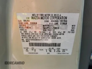 2005 Mazda Tribute i with VIN 4F2YZ02Z85KM31234, listed as a Copart auction lot 68669434 with 211,921 mi miles and Salvage Title. Bid and sale history available at carsss.com. Image 13.