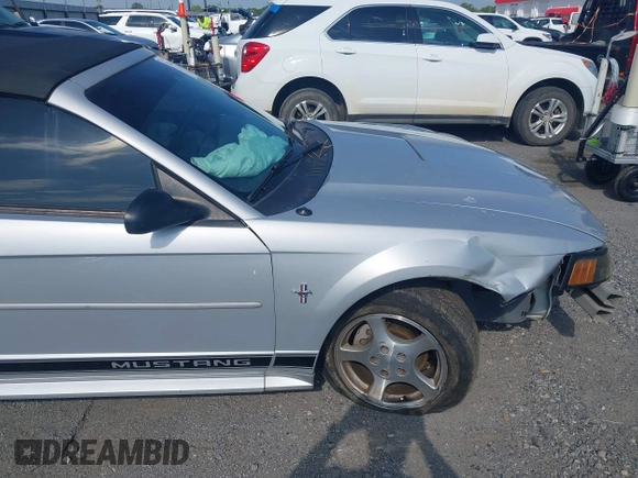 2002 Ford Mustang Deluxe with VIN 1FAFP44432F205991, listed as a IAAI auction lot 42144709 with 138,119 mi miles and . Bid and sale history available at DreamBid. Image 16.