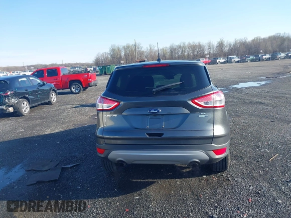 2016 Ford Escape SE with VIN 1FMCU9GX1GUB67636, listed as a IAAI auction lot 41929725 with 68,297 mi miles. Bid and sale history available at carsss.com. Image 16.