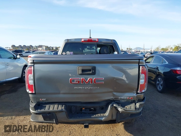 2021 GMC Canyon 4WD AT4 w/Leather with VIN 1GTG6FEN9M1123638, listed as a IAAI auction lot 41852163 with 77,442 mi miles. Bid and sale history available at carsss.com. Image 16.