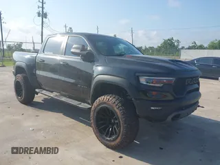 2022 Ram 1500 TRX with VIN 1C6SRFU9XNN249207, listed as a IAAI auction lot 42383861 with 27,211 mi miles and . Bid and sale history available at DreamBid. Image 1.