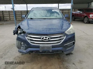 2017 Hyundai Santa Fe 2.4L z VIN 5XYZT3LB7HG382157, wystawiony jako Copart lot #52072405 z przebiegiem 139 285 mil mil oraz Czysty tytuł • Clean title. Historia ofert i sprzedaży dostępna na DreamBid. Obrazek 5.
