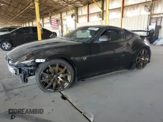 2009 Nissan 370Z z VIN JN1AZ44E19M411715, wystawiony jako Copart lot #56654815 z przebiegiem 123 791 mil mil oraz Szkoda całkowita • Salvage title. Historia ofert i sprzedaży dostępna na DreamBid. Obrazek 1.