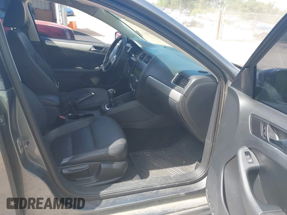2012 Volkswagen Jetta TDI with VIN 3VWLL7AJ4CM004457, listed as a IAAI auction lot 42624318 with 259,108 mi miles and . Bid and sale history available at DreamBid. Image 5.