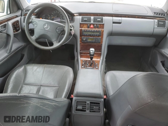 2000 Mercedes-Benz E-Class with VIN WDBJF70J1YB078418, listed as a Copart auction lot 71177244 with 189,838 mi miles and Salvage Title. Bid and sale history available at carsss.com. Image 8.