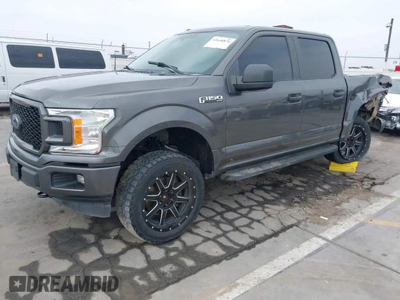 2018 Ford F-150 XL with VIN 1FTEW1EP4JKD45070, listed as a IAAI auction lot 42648874 with 140,424 mi miles and . Bid and sale history available at DreamBid. Image 2.