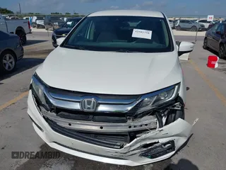 2018 Honda Odyssey EX with VIN 5FNRL6H57JB100035, listed as a IAAI auction lot 42582758 with 88,585 mi miles and . Bid and sale history available at DreamBid. Image 6.