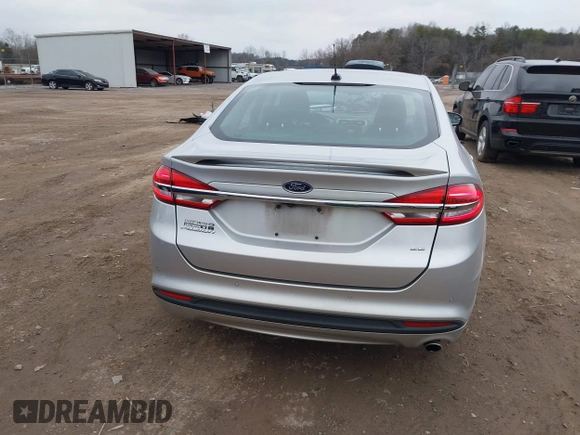 2017 Ford Fusion SE z VIN 3FA6P0H78HR174956, wystawiony jako IAAI lot #41258610 z przebiegiem 70 180 mil mil oraz . Historia ofert i sprzedaży dostępna na DreamBid. Obrazek 16.