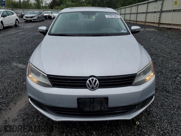2011 Volkswagen Jetta SE with VIN 3VWDZ7AJ5BM319091, listed as a Copart auction lot 57991585 with 185,458 mi miles and Salvage title. Bid and sale history available at DreamBid. Image 5.