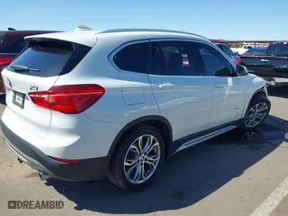 2017 BMW X1 xDrive28i with VIN WBXHT3C30H5F68187, listed as a IAAI auction lot 41830892 with 101,313 mi miles. Bid and sale history available at carsss.com. Image 4.