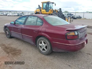 2001 Pontiac Bonneville SE z VIN 1G2HX54K814207144, wystawiony jako IAAI lot #42223805 z przebiegiem 237 762 mil mil oraz . Historia ofert i sprzedaży dostępna na DreamBid. Obrazek 3.