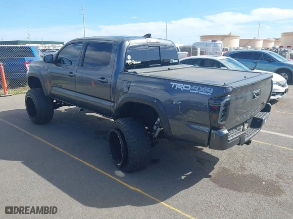 2021 Toyota Tacoma 4WD SR with VIN 3TMCZ5ANXMM447464, listed as a IAAI auction lot 41409203 with 39,390 mi miles. Bid and sale history available at carsss.com. Image 3.