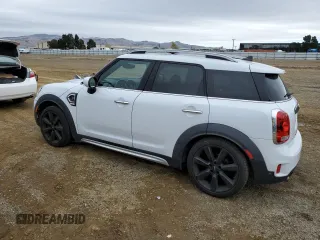 2020 MINI Countryman Cooper S with VIN WMZYW7C00L3L48776, listed as a Copart auction lot 80785704 with 84,194 mi miles and Salvage title. Bid and sale history available at DreamBid. Image 2.