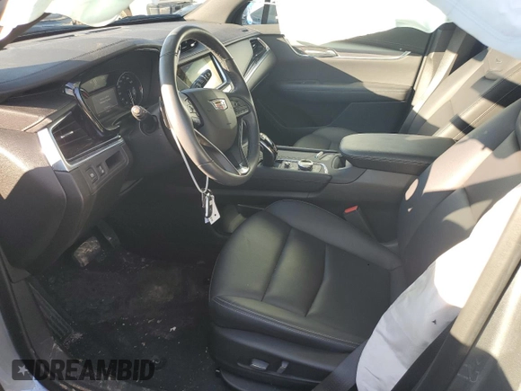 2023 Cadillac XT6 FWD Luxury z VIN 1GYKPAR48PZ115719, wystawiony jako Copart lot #87848435 z przebiegiem 17 597 mil mil oraz Szkoda całkowita • Salvage title. Historia ofert i sprzedaży dostępna na DreamBid. Obrazek 7.