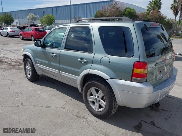 2007 Ford Escape Hybrid with VIN 1FMCU59H37KA92464, listed as a IAAI auction lot 42001479 with 159,147 mi miles. Bid and sale history available at carsss.com. Image 3.