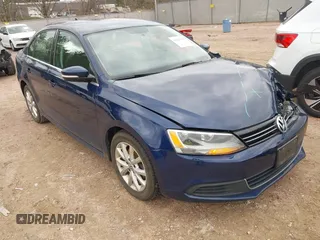 2013 Volkswagen Jetta Sedan SE w/Convenience/Sunroof with VIN 3VWBP7AJ3DM357905, listed as a IAAI auction lot 42065633 with 124,015 mi miles. Bid and sale history available at carsss.com. Image 1.