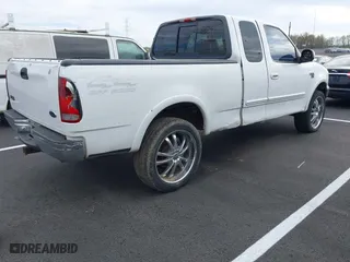 2000 Ford F-150 XL with VIN 1FTRX18W0YNA85809, listed as a IAAI auction lot 41848764 with 1 mi miles. Bid and sale history available at carsss.com. Image 4.