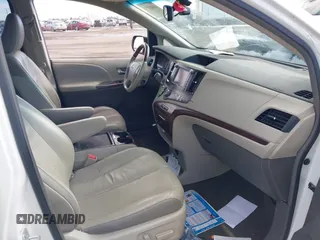 2011 Toyota Sienna XLE AAS with VIN 5TDYK3DC8BS045352, listed as a IAAI auction lot 41401955 with 142,492 mi miles and . Bid and sale history available at DreamBid. Image 5.