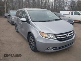2016 Honda Odyssey Touring Elite with VIN 5FNRL5H96GB062318, listed as a IAAI auction lot 41660493 with 137,269 mi miles. Bid and sale history available at carsss.com. Image 1.