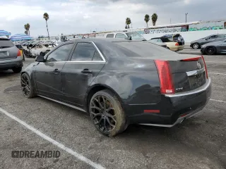 2011 Cadillac CTS with VIN 1G6DA5EY7B0132575, listed as a Copart auction lot 72469184 with 124,370 mi miles and Salvage Title. Bid and sale history available at DreamBid. Image 2.