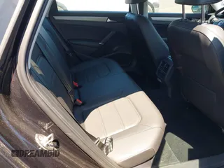 2021 Volkswagen Passat SE z VIN 1VWSA7A30MC003988, wystawiony jako IAAI lot #42238431 z przebiegiem 43 208 mil mil oraz . Historia ofert i sprzedaży dostępna na DreamBid. Obrazek 8.