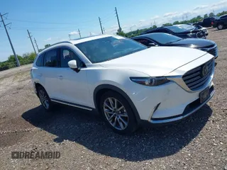 2016 Mazda CX-9 Grand Touring with VIN JM3TCBDY7G0125708, listed as a IAAI auction lot 39891843 with 133,988 mi miles. Bid and sale history available at carsss.com. Image 1.