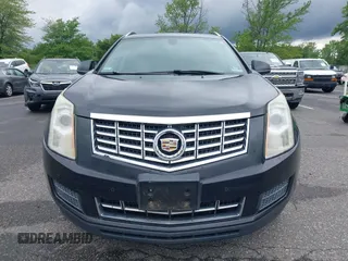 2015 Cadillac SRX Luxury Collection z VIN 3GYFNEE34FS510360, wystawiony jako IAAI lot #42343737 z przebiegiem 149 046 mil mil oraz . Historia ofert i sprzedaży dostępna na DreamBid. Obrazek 12.