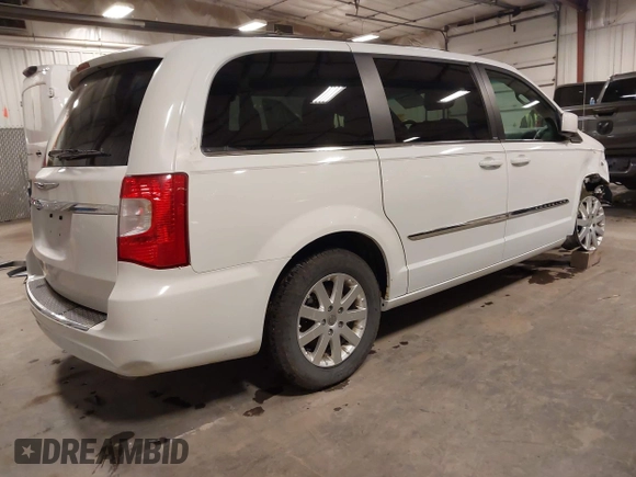 2014 Chrysler Town & Country Touring with VIN 2C4RC1BG1ER209212, listed as a IAAI auction lot 41931026 with 170,256 mi miles and . Bid and sale history available at DreamBid. Image 4.