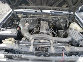 1991 Nissan Frontier with VIN 1N6SD11S9MC419923, listed as a Copart auction lot 85189314 with 245,003 mi miles and Salvage title. Bid and sale history available at DreamBid. Image 11.