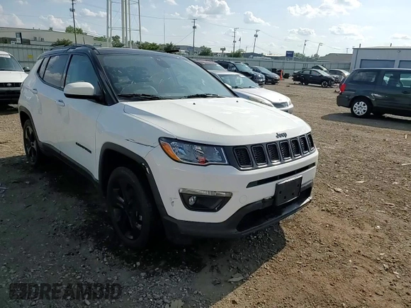 2019 Jeep Compass Latitude z VIN 3C4NJDBB2KT696732, wystawiony jako Copart lot #60519335 z przebiegiem 85 436 mil mil oraz Szkoda całkowita • Salvage title. Historia ofert i sprzedaży dostępna na DreamBid. Obrazek 14.