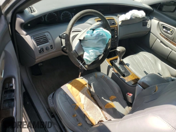 2000 Toyota Avalon XL with VIN 4T1BF28B4YU059562, listed as a Copart auction lot 58356285 with Not provided miles and Salvage title. Bid and sale history available at DreamBid. Image 8.