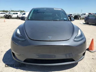 2023 Tesla Model Y Long Range z VIN 7SAYGDEE8PA185193, wystawiony jako Copart lot #48706215 z przebiegiem 10 451 mil mil oraz Szkoda całkowita • Salvage title. Historia ofert i sprzedaży dostępna na DreamBid. Obrazek 5.