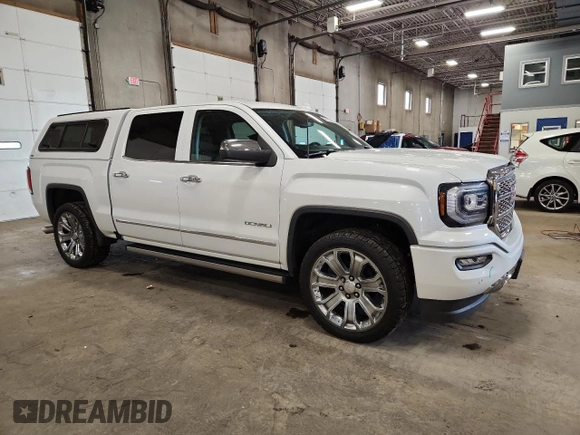2018 GMC Sierra 1500 Denali z VIN 3GTU2PEJ2JG587157, wystawiony jako Copart lot #58516315 z przebiegiem 88 855 mil mil oraz Szkoda całkowita • Salvage title. Historia ofert i sprzedaży dostępna na DreamBid. Obrazek 4.