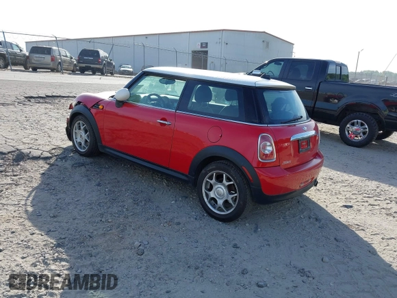 2012 MINI Hardtop with VIN WMWSU3C59CT260497, listed as a IAAI auction lot 42083090 with 123,498 mi miles and . Bid and sale history available at DreamBid. Image 3.