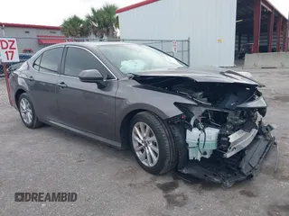 2023 Toyota Camry LE z VIN 4T1C11AK9PU164362, wystawiony jako IAAI lot #41223454 z przebiegiem 21 396 mil mil oraz . Historia ofert i sprzedaży dostępna na DreamBid. Obrazek 1.