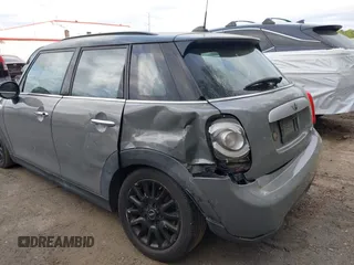 2015 MINI Hardtop 4 Door with VIN WMWXS5C57FT831660, listed as a IAAI auction lot 42057682 with 110,940 mi miles and . Bid and sale history available at DreamBid. Image 6.