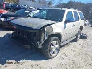 2014 Chevrolet Tahoe LTZ z VIN 1GNSCCE00ER228911, wystawiony jako IAAI lot #41732239 z przebiegiem 216 743 mil mil oraz . Historia ofert i sprzedaży dostępna na DreamBid. Obrazek 18.