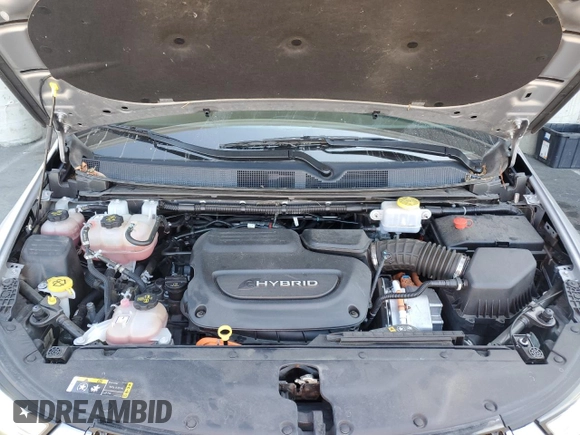 2021 Chrysler Pacifica Hybrid Touring L with VIN 2C4RC1L7XMR593911, listed as a Copart auction lot 57842415 with 74,910 mi miles and Salvage title. Bid and sale history available at DreamBid. Image 12.