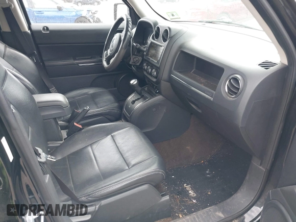 2014 Jeep Patriot Limited with VIN 1C4NJRCB2ED686692, listed as a IAAI auction lot 41922510 with 137,039 mi miles and . Bid and sale history available at DreamBid. Image 5.