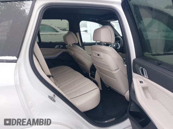 2020 BMW X5 M50i with VIN 5UXJU4C09LLE45658, listed as a IAAI auction lot 41307154 with 69,936 mi miles and . Bid and sale history available at DreamBid. Image 8.