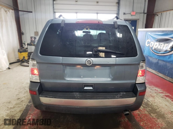 2010 Mercury Mariner z VIN 4M2CN9B70AKJ24170, wystawiony jako Copart lot #49241535 z przebiegiem 118 661 mil mil oraz Szkody całkowita. Historia ofert i sprzedaży dostępna na DreamBid. Obrazek 6.