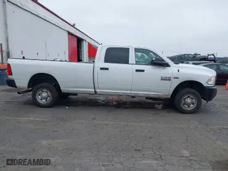2018 Ram 2500 Tradesman with VIN 3C6UR5HJ7JG240216, listed as a IAAI auction lot 41371971 with 143,069 mi miles. Bid and sale history available at carsss.com. Image 13.