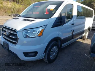 2020 Ford Transit Passenger XL with VIN 1FBAX2Y81LKA59805, listed as a IAAI auction lot 41710846 with 89,840 mi miles and . Bid and sale history available at DreamBid. Image 2.