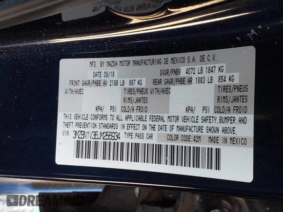 2018 Mazda 3 Touring with VIN 3MZBN1V36JM256934, listed as a IAAI auction lot 41828741 with 58,849 mi miles. Bid and sale history available at carsss.com. Image 9.